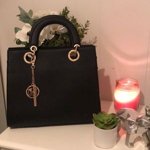Studio Badgley Mischka handbag with extension.